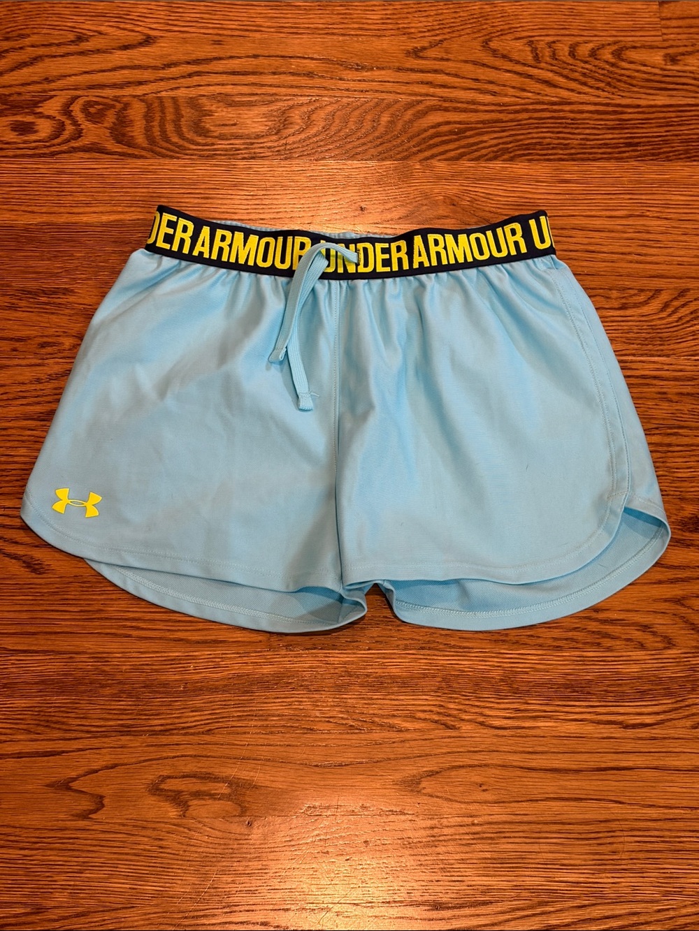 Under Armour Light Blue Youth Athletic Shorts with Yellow Branded Waistband